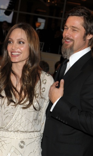 Angelina Jolie e Brad Pitt em um baile da UNICEF em hotel de Beverly Hills (10/12/2009)