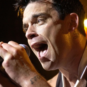 O cantor britânico Robbie Williams durante show em Paris - Bertrand Guay/AFP