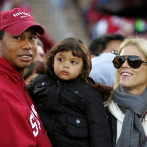 Tiger Woods é visto com a filha Sam ao lado da ex-mulher Elin Nordegren; família reduziu agenda - Ezra Shaw/Getty Images