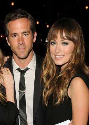Os atores Ryan Reynolds e Olivia Wilde durante festa da revista "Details" dedicada ao ator (6/6/11)