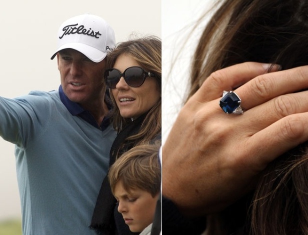 Shane Warne e Elizabeth Hurley vão a campeonato de golfe com o filho da atriz, Damian. Hurley ainda exibe o anel de noivado, um dia após ter recebido a proposta de casamento (01/10/11)