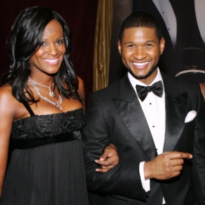 Usher chega acompanhado da ex-mulher, Tameka Raymond, no prêmio Trumpets de 2007 (22/1/07)