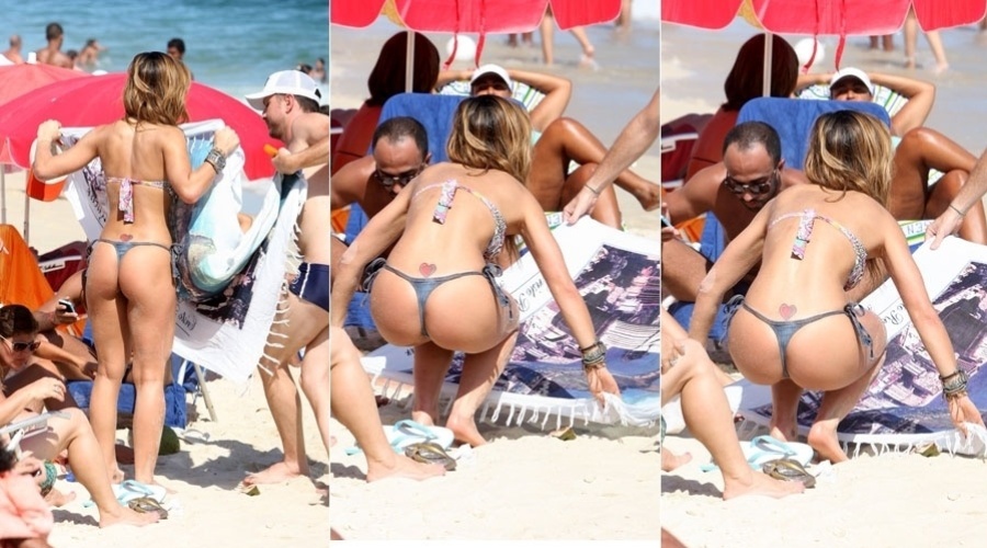 Sabrina Sato exibe o corpo vestindo biquíni fio-dental em praia do Rio (24/1/12)