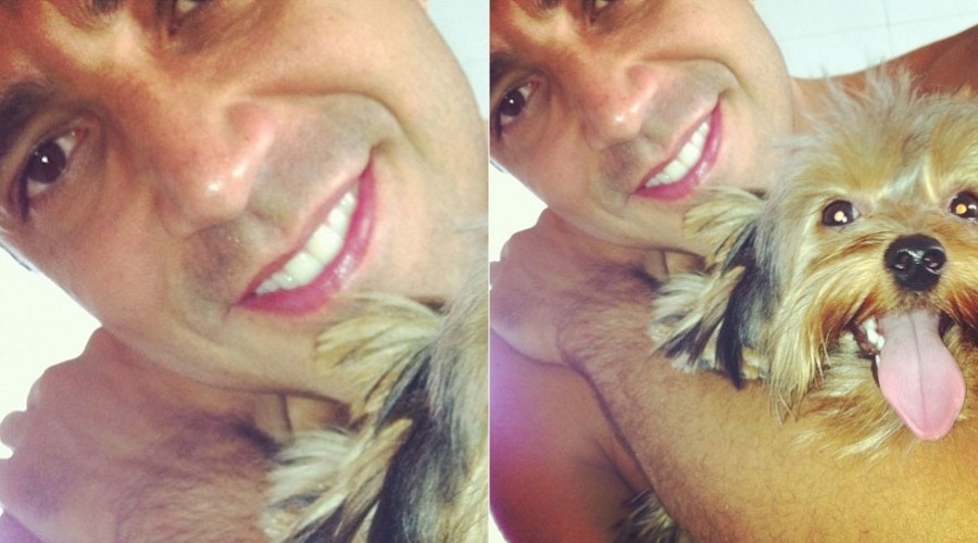 Latino posa abraçado ao seu cãozinho, o yorkshire  Pocker (26/1/12)