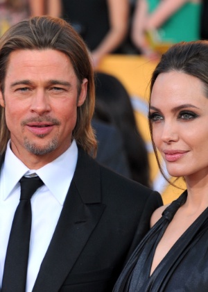 O casal Angelina Jolie e Brad Pitt chegam ao Screen Actors Guild Awards em Los Angeles. Brad Pitt  está concorrendo ao prêmio de Melhor Ator pelo filme"O Homem que Mudou o Jogo" (29/1/12)