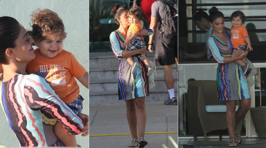 Juliana Paes deixa a academia com o filho, Pedro, no colo (6/2/2012)