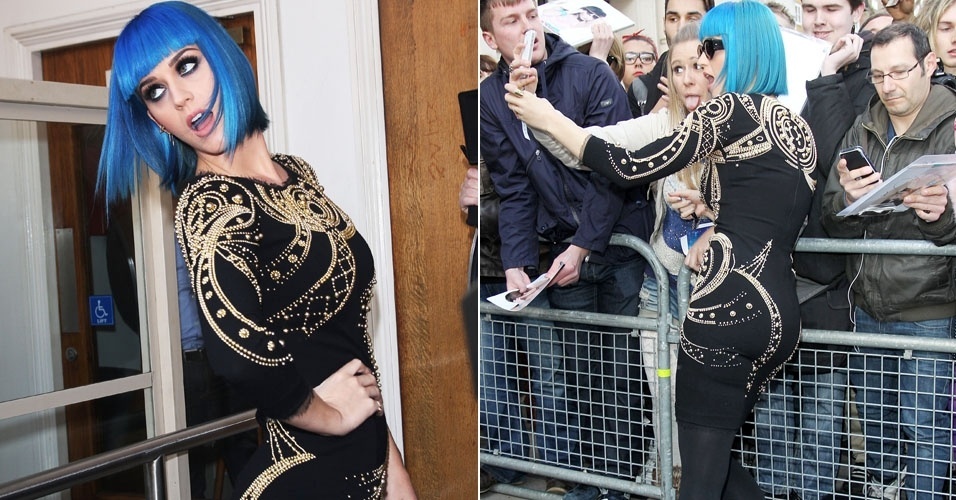 De franja, a cantora Katy Perry posou e fez caras e bocas ao lado dos fãs nos estúdios Maida Vale, em Londres (19/3/12)