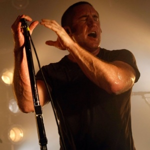 O vocalista Trent Reznor, durante show da sua antiga banda Nine Inch Nails  - Getty Images
