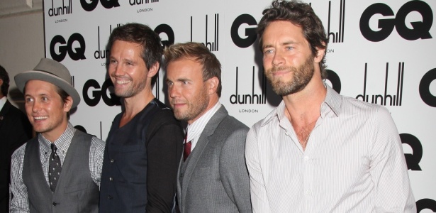 Os integrantes do Take That Mark Owen, Jason Orange, Gary Barlow e Howard Donald no prmio GQ Men Of The Year Awards no The Royal Opera House, em Londres (08/09/2009)