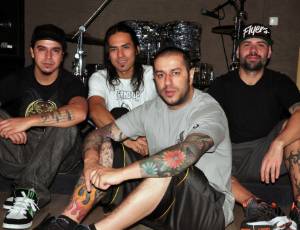 Os integrantes do CPM 22 Heitor Gomes (baixo), Japinha (bateria), Badaui (vocal) e Luciano (guitarra)